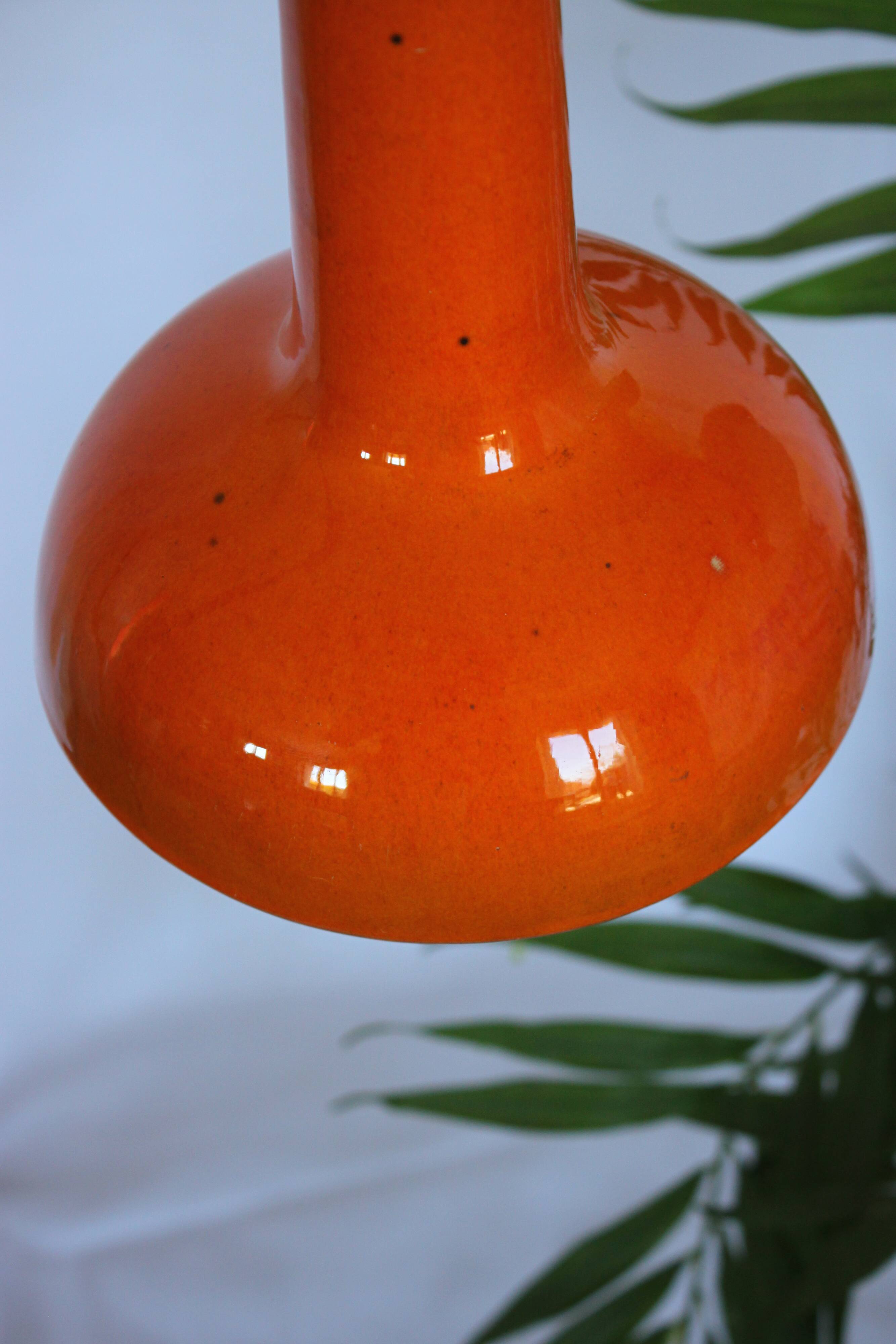 Rare pair of Orange enamelled ceramic hanging