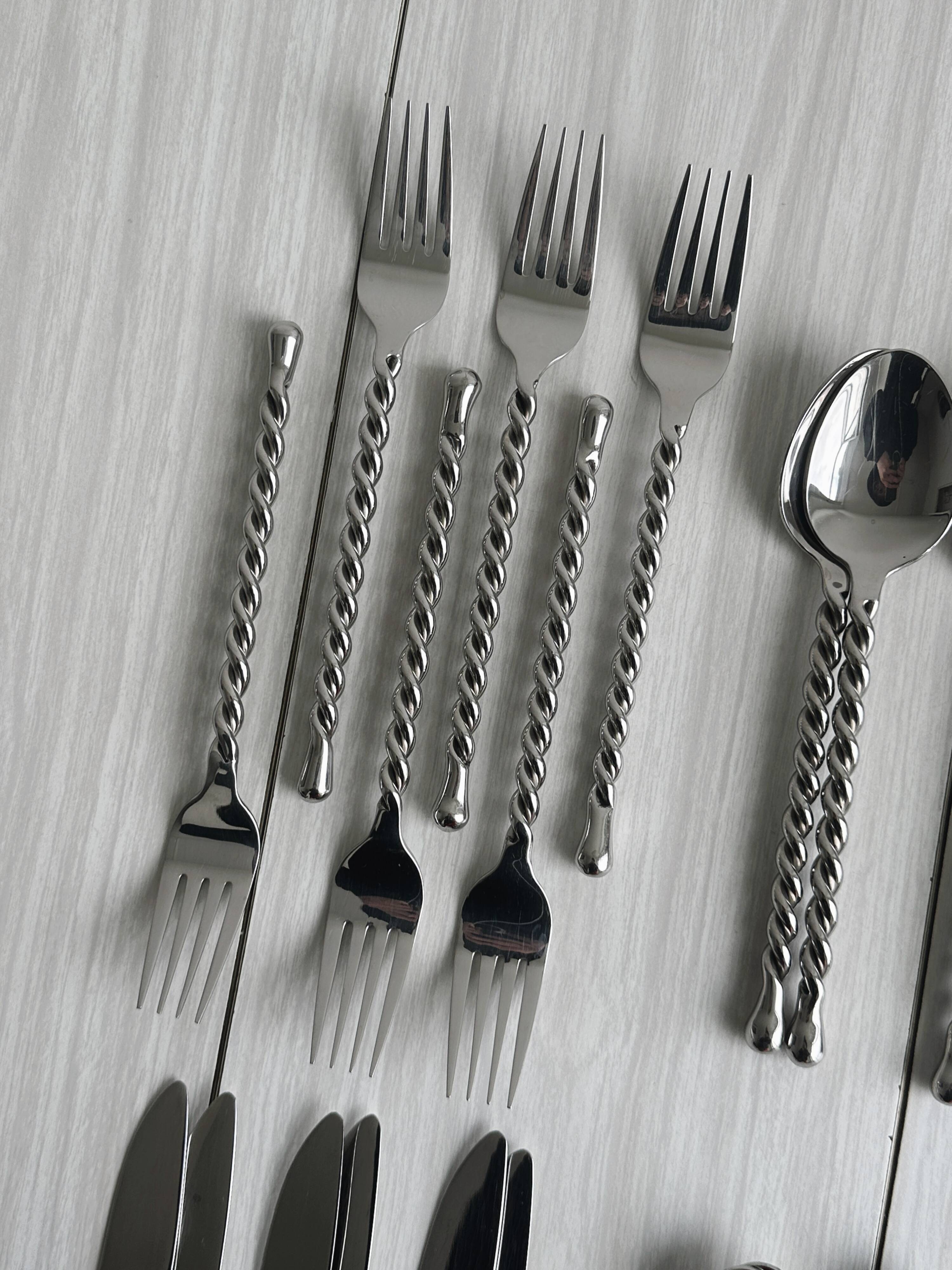 24 antique silver-plated twisted metal cutlery sets
