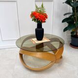 Smoked glass and curved wood coffee table