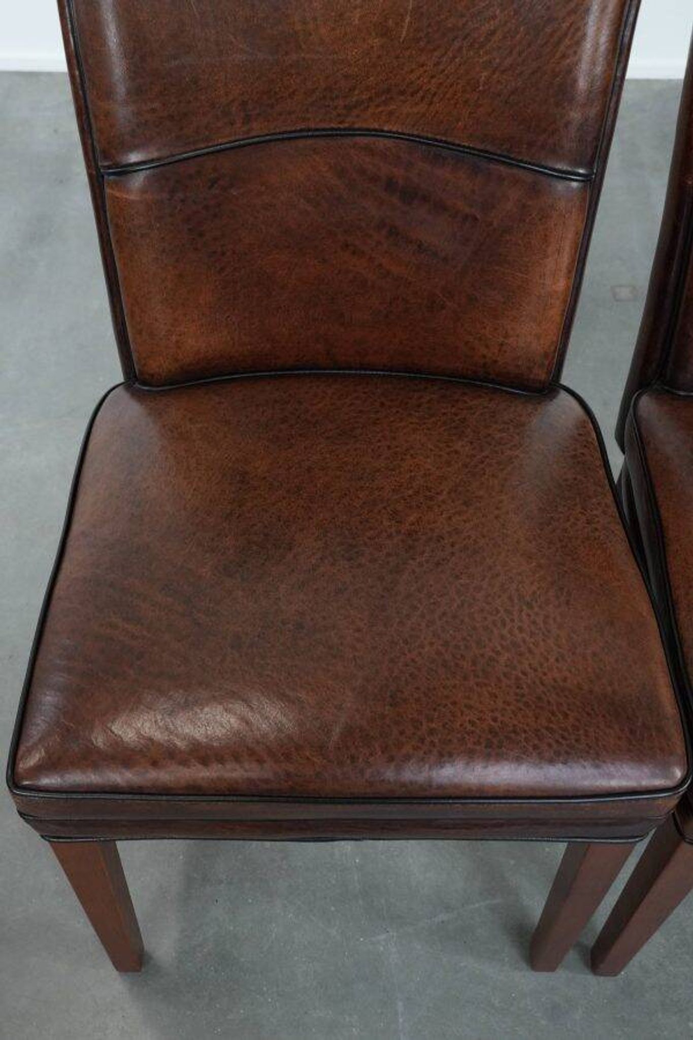 Comfortable set of 2 sheep leather dining chairs with character