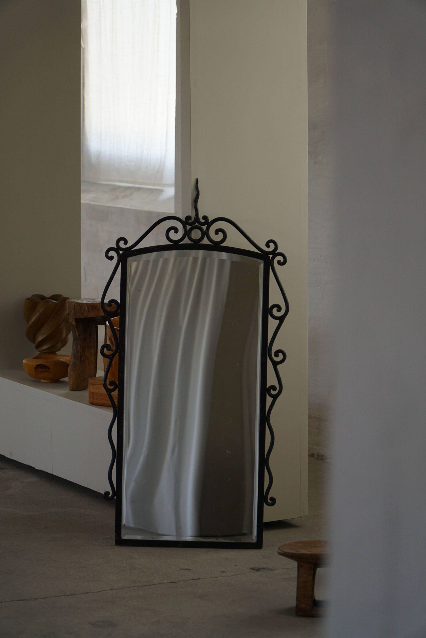 French mid-century brutalist wall mirror in wrought iron, made in the 1950s.