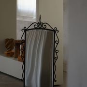 French mid-century brutalist wall mirror in wrought iron, made in the 1950s.