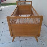 Vintage baby bed in wood and rattan from the 60s for children