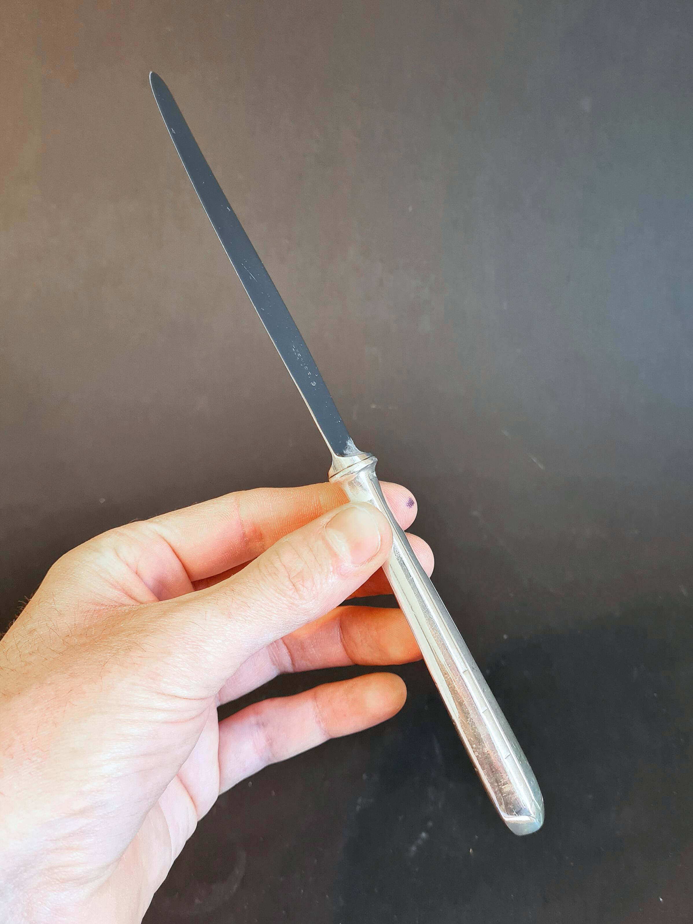 Duo of Christofle knives, "Tosca" model, in Alfenide