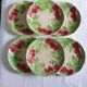 Six slip plates with strawberry decoration