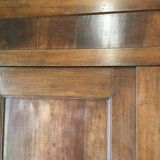 Front of old double door walnut cabinet