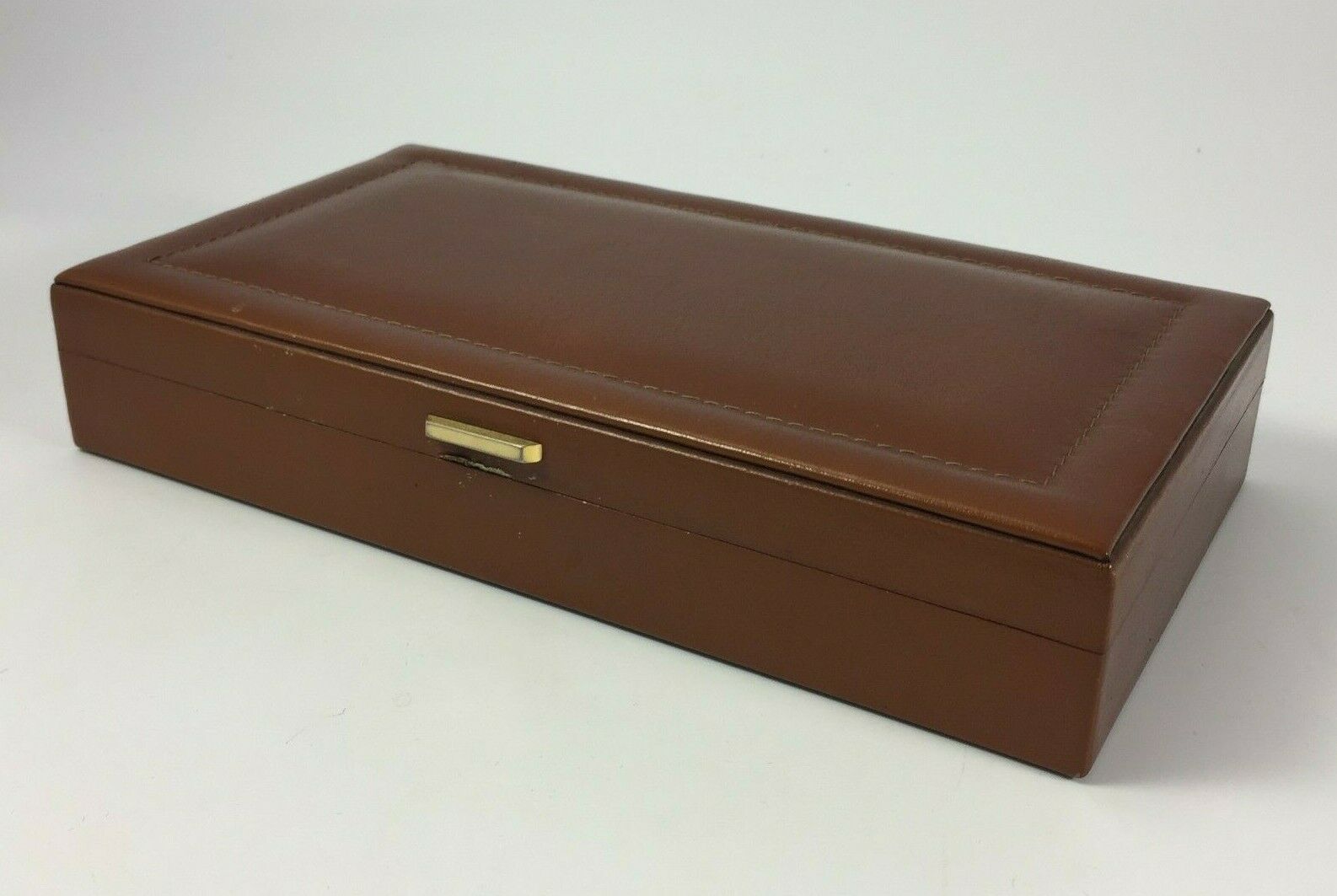 2 boxes the leather tanner box has games and box a cigars