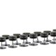 Low cylindrical black stool with steel base. 1970s