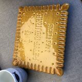 Underside of dish small butter read