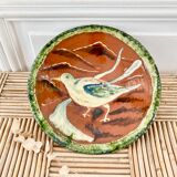 Decorative cut dish in terracotta