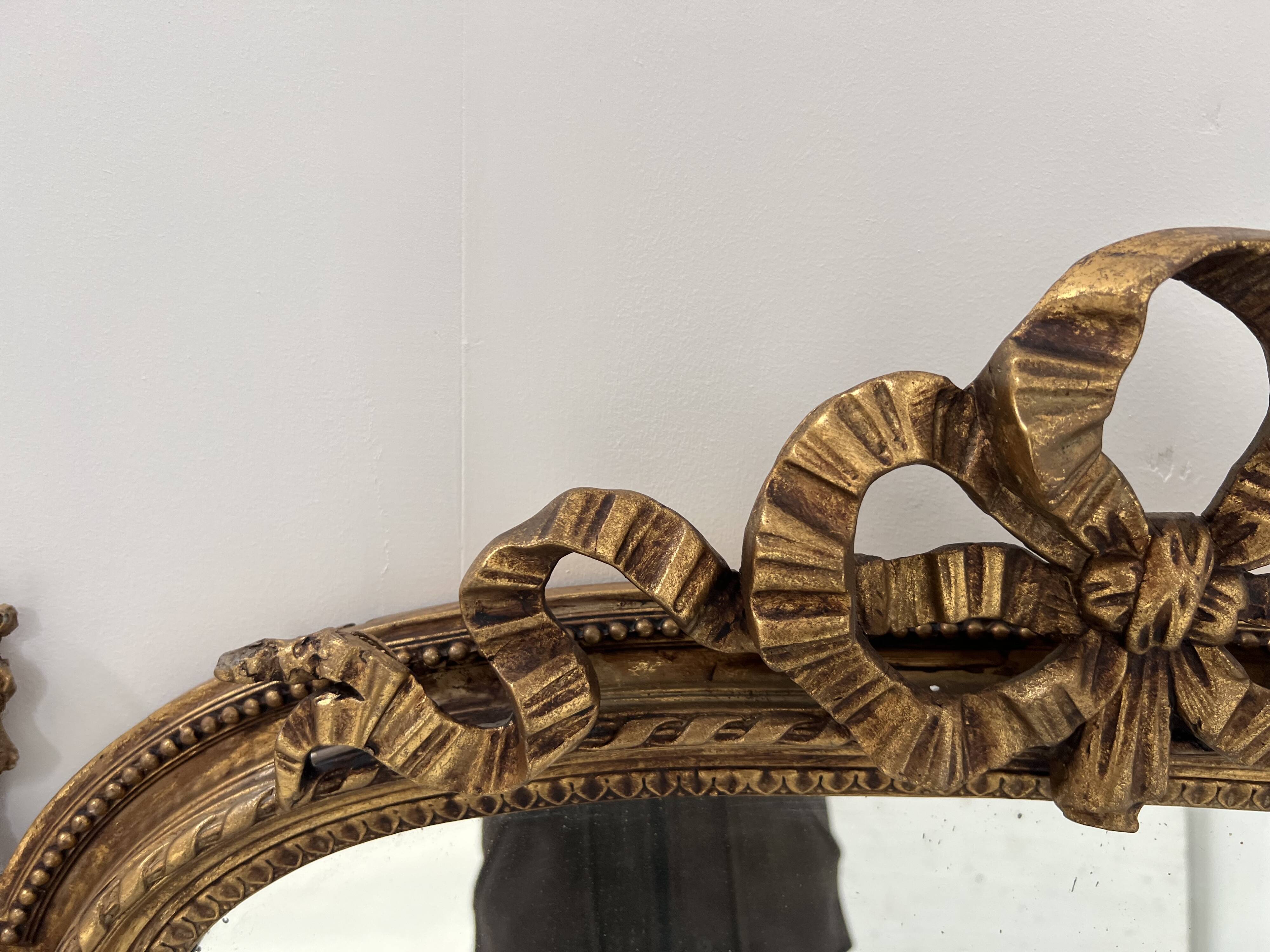 Louis XVI style mirror in wood and gilded stucco, 19th century