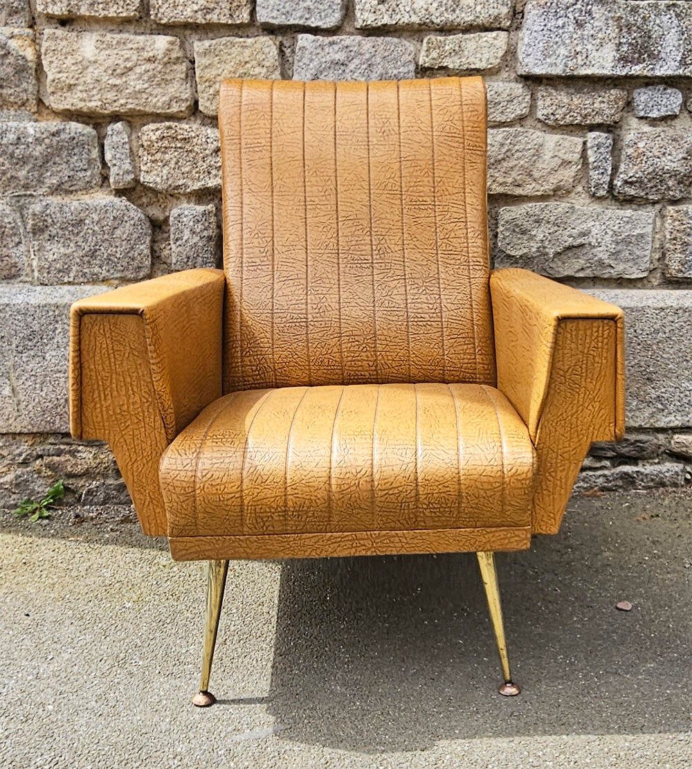 Pair of mustard skaï armchairs, brass feet