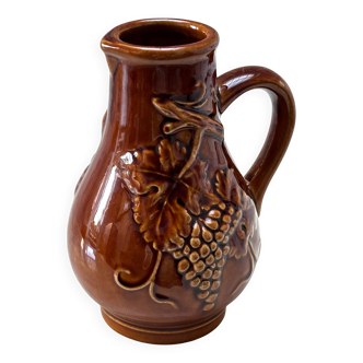 vintage ceramic pitcher with grape and vine decor