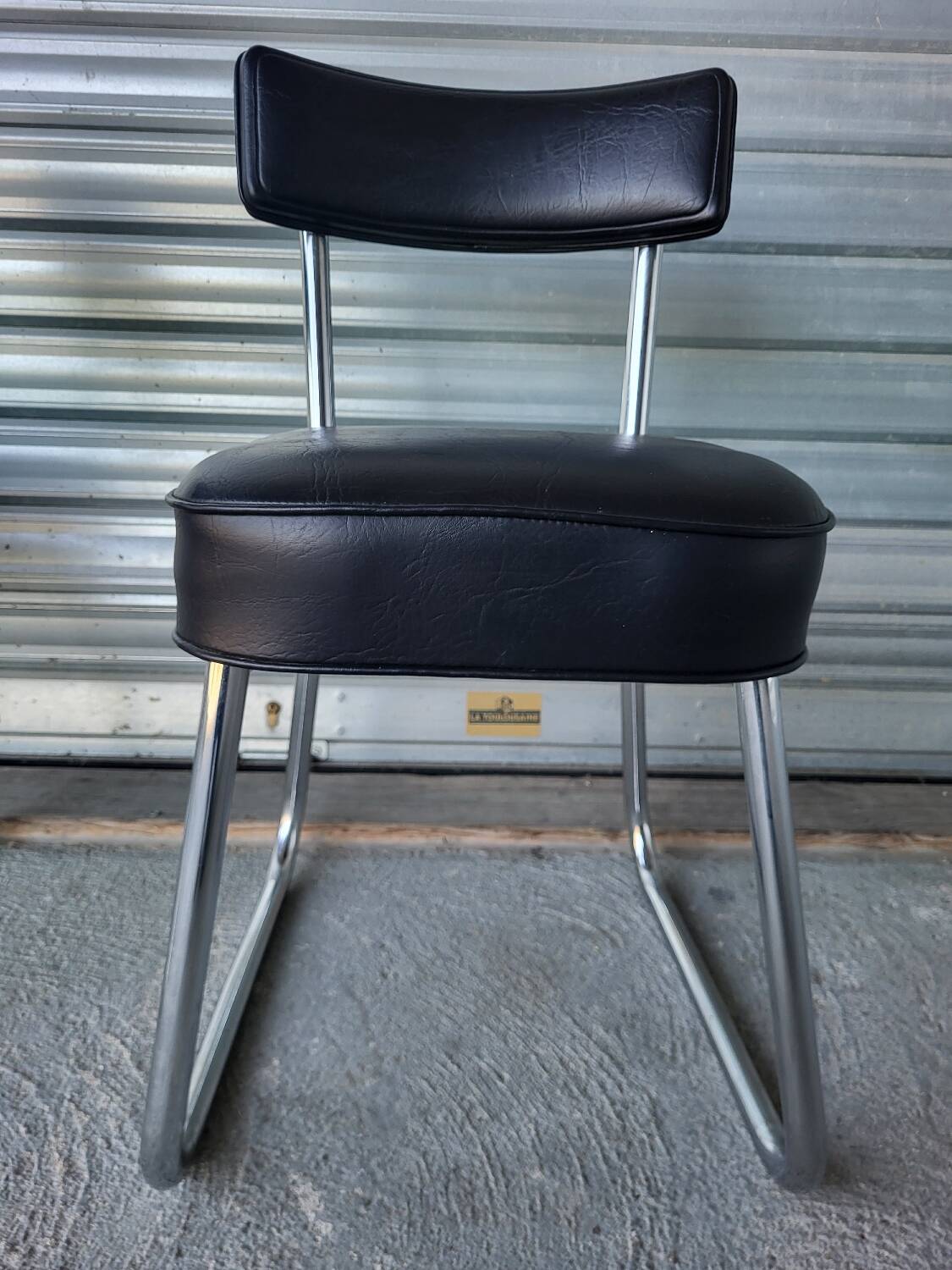 Pair of vintage black and chrome leatherette office chairs in very good condition