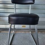 Pair of vintage black and chrome leatherette office chairs in very good condition