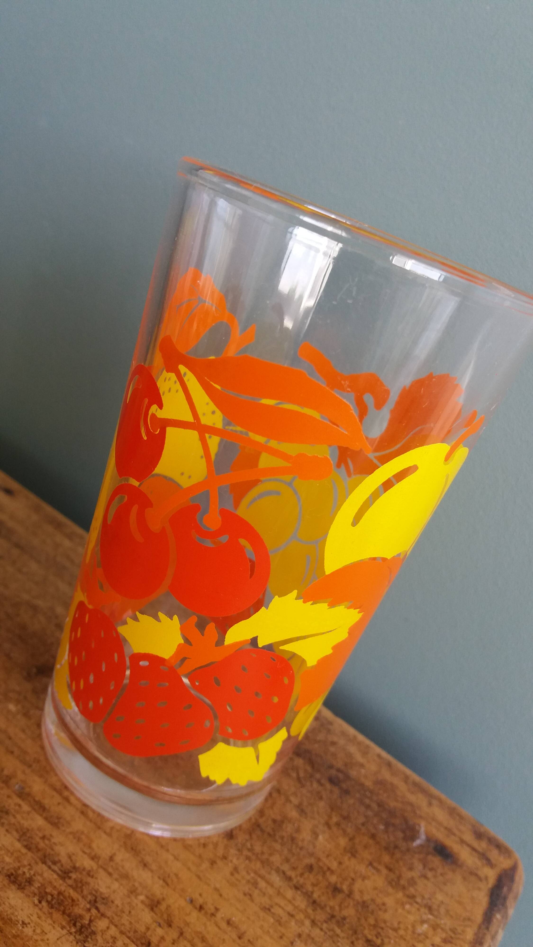 Verres vintage décorated with orange and yellow lemon fruits, Italy.