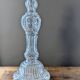 Legras candlestick in molded glass with faces in relief, vintage carafe