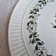 Oval dish in Gien France earthenware, green flower decoration, relief woven edge.
