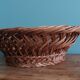 Antique basket, fruit basket or bread basket made of wicker