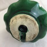 Old candleholder, glazed terracotta cellar, artisanal green color