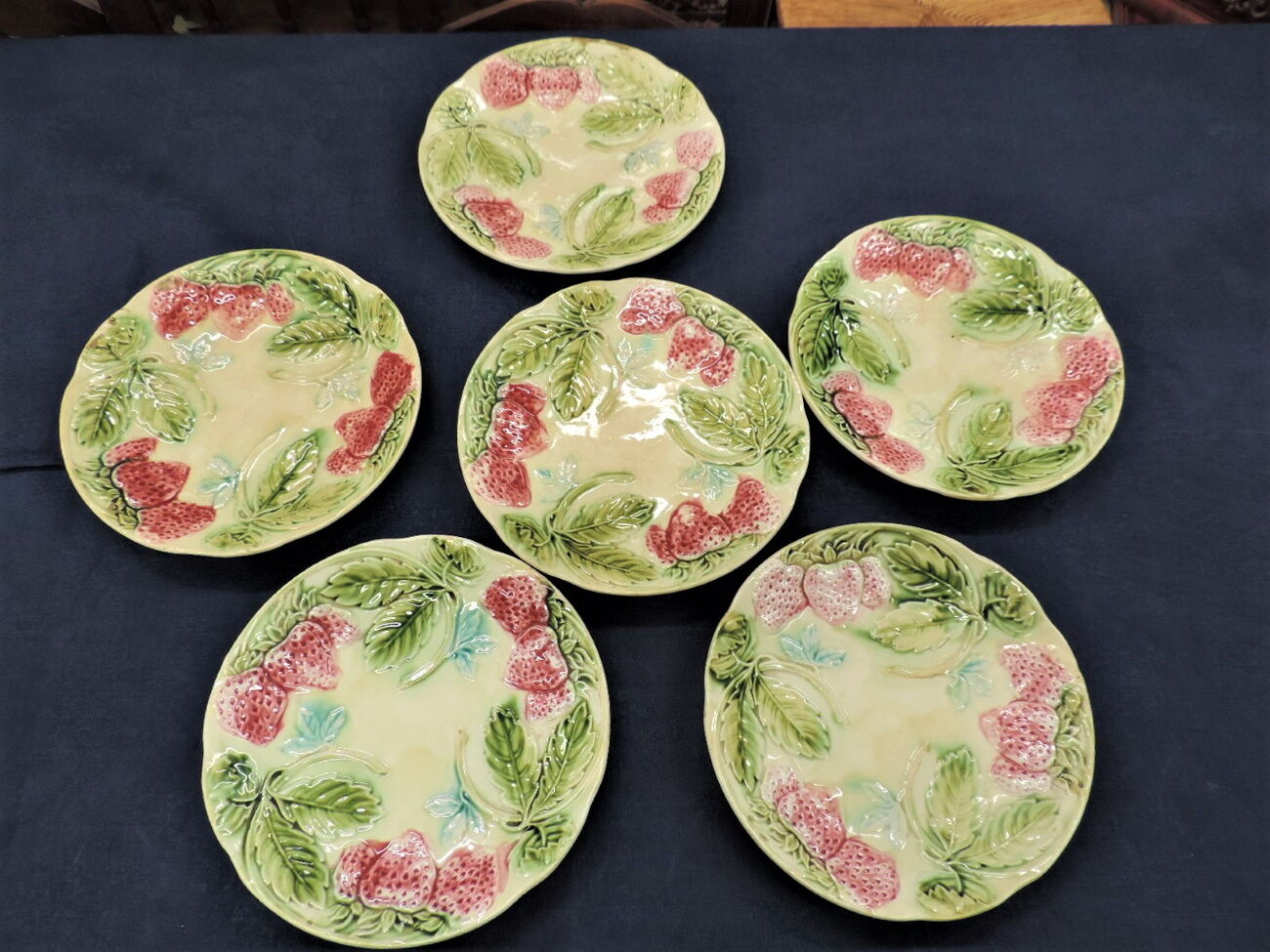 Set of six old slurry dessert plates