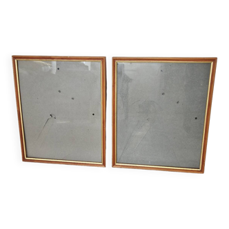 Pair of wooden frames with gold edging