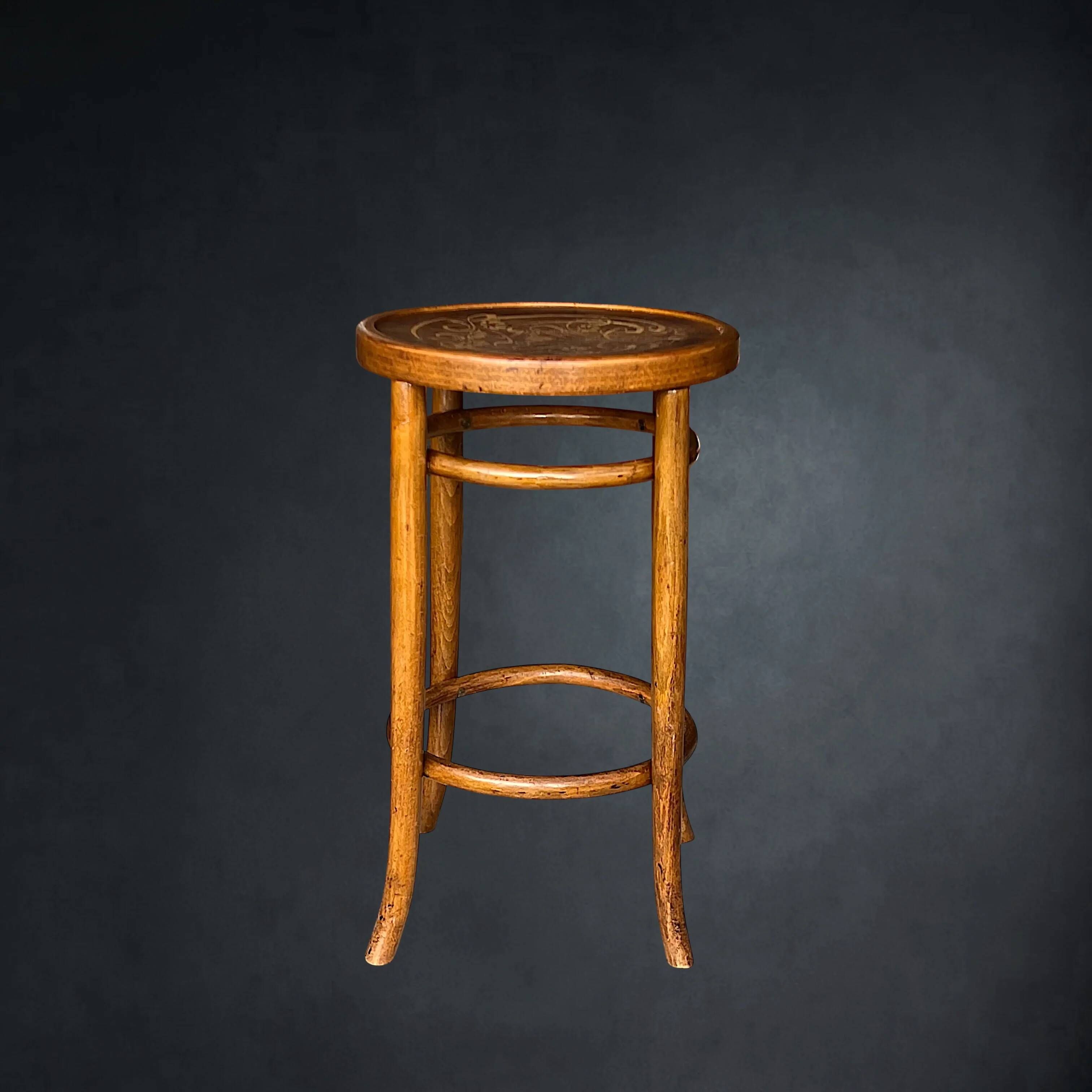 Antique high bistro stool in curved wood with a floral decorated top, Thonet style – around 1900