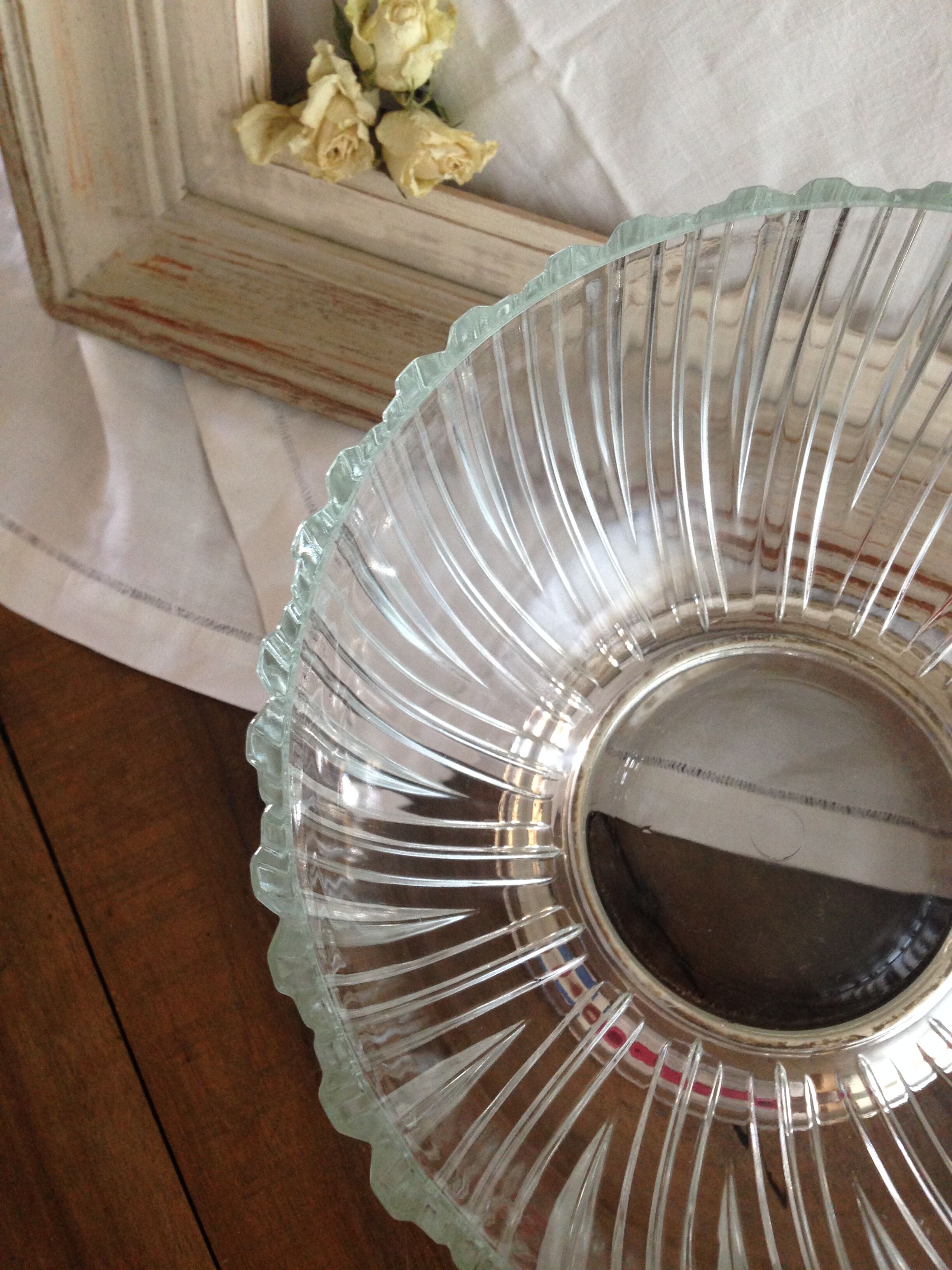 silver metal stand glass bowl