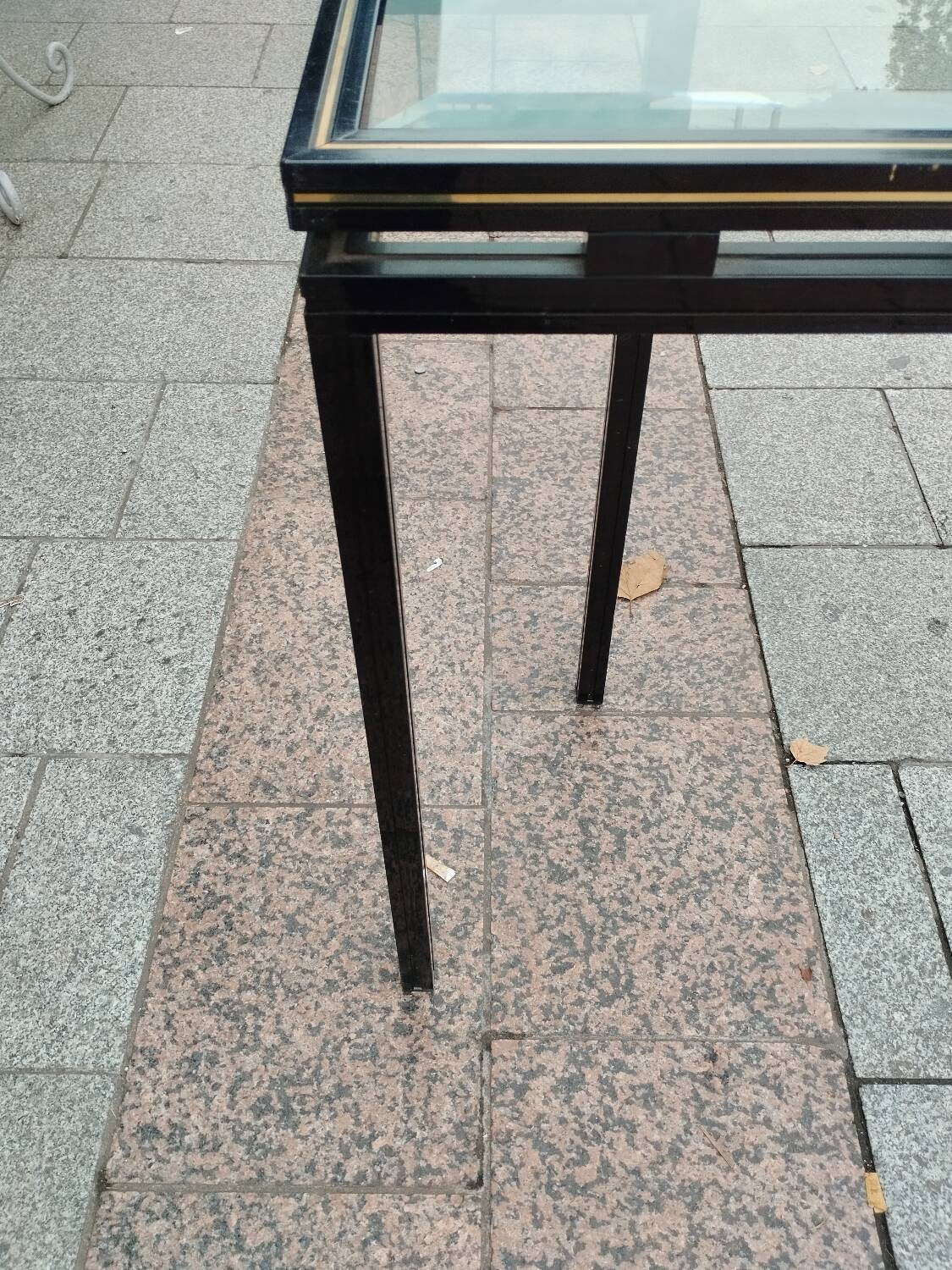 Old console with vintage glass top