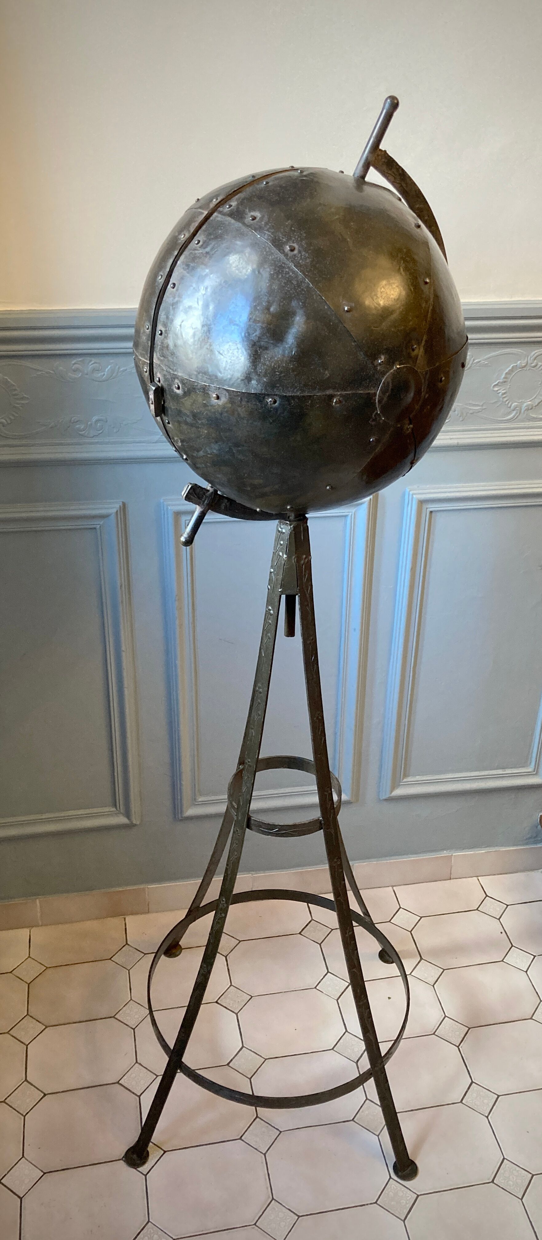 Atypical industrial furniture riveted sphere