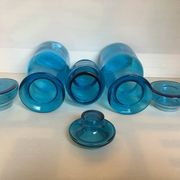 Trio of blue glass candy jars from the 70s