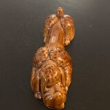10 ceramic knife holders in the shape of a recumbent poodle