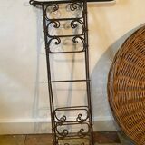 Rattan table with folding legs