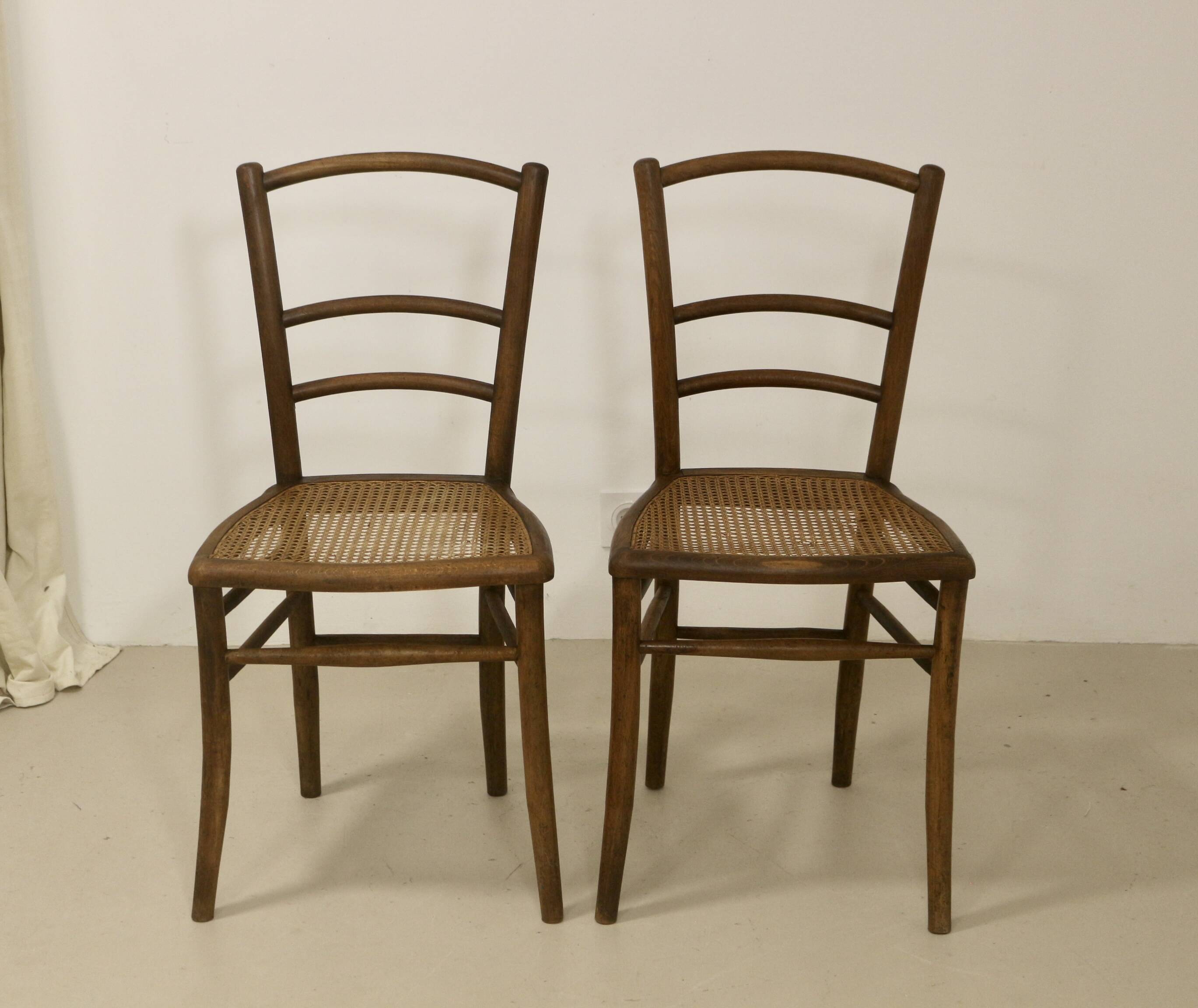 Pair of bistro chairs with canework. Ref Brunelle