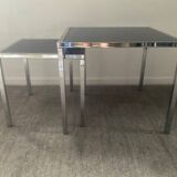 Pair of nesting tables in chromed metal and glass