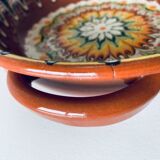 Colorful terracotta dish or salad bowl