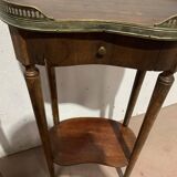 Pair of Louis XVI style kidney bedside tables with brass gallery, 20th century