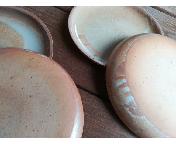 Lot of 4 deep plates made of vintage sandstone