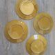 Four antique dessert plates in majolica with vine decoration.