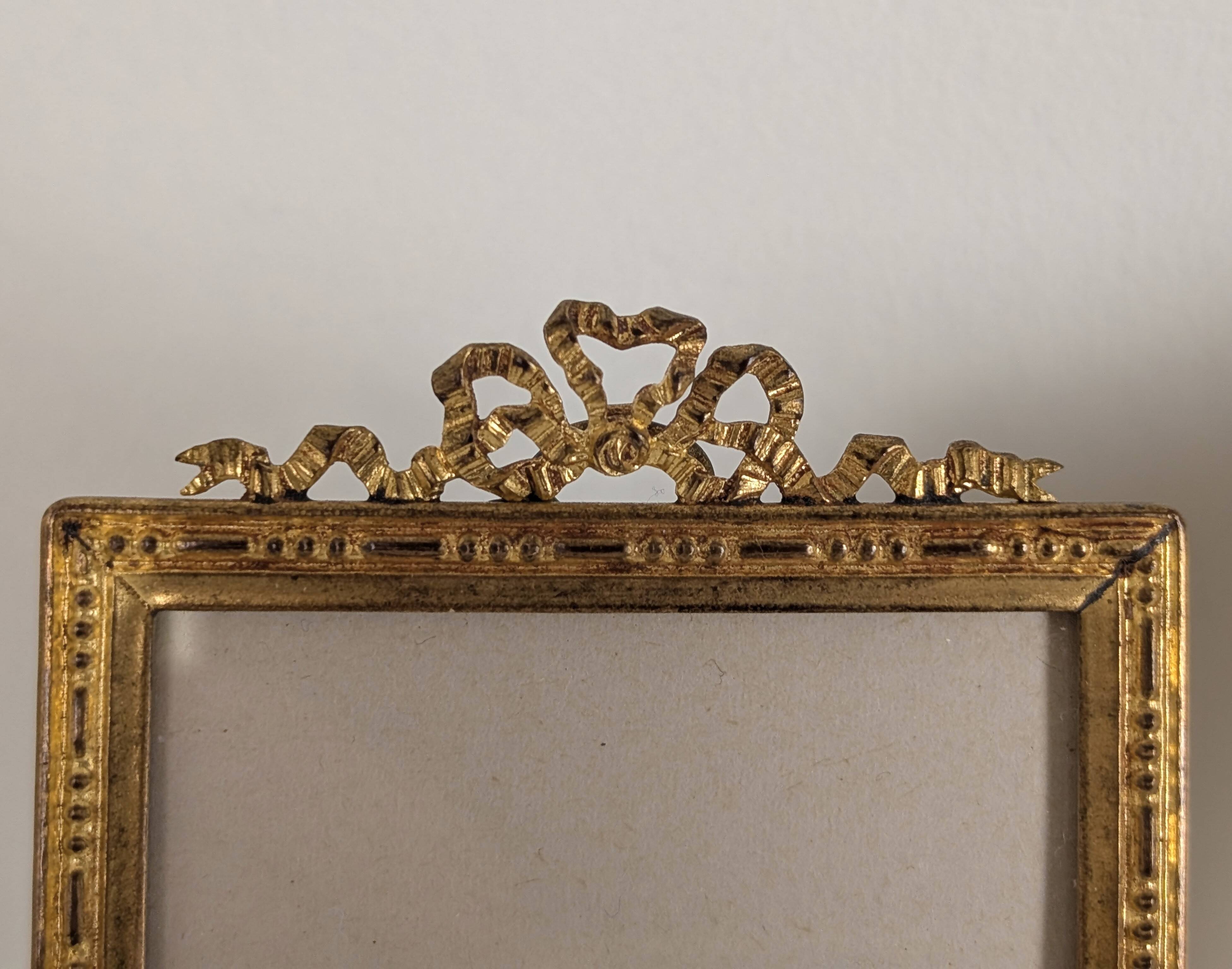 Pair of gilt bronze photo frames