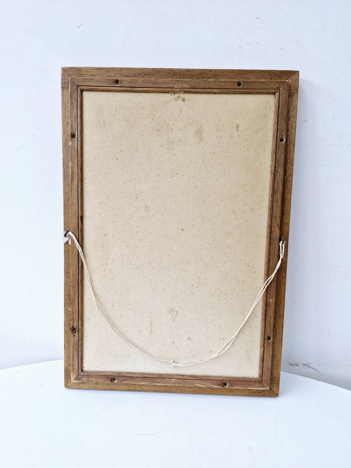 Canvas under vintage pink frame on black background