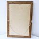 Canvas under vintage pink frame on black background