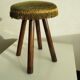 Tabouret en bois et velours à franges