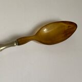Spoon made of horn and silver metal