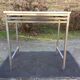 Vintage table with square chrome tubular metal base and marble top.
