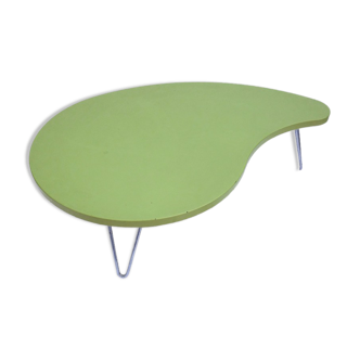 Almond green coffee table in the form of beauty