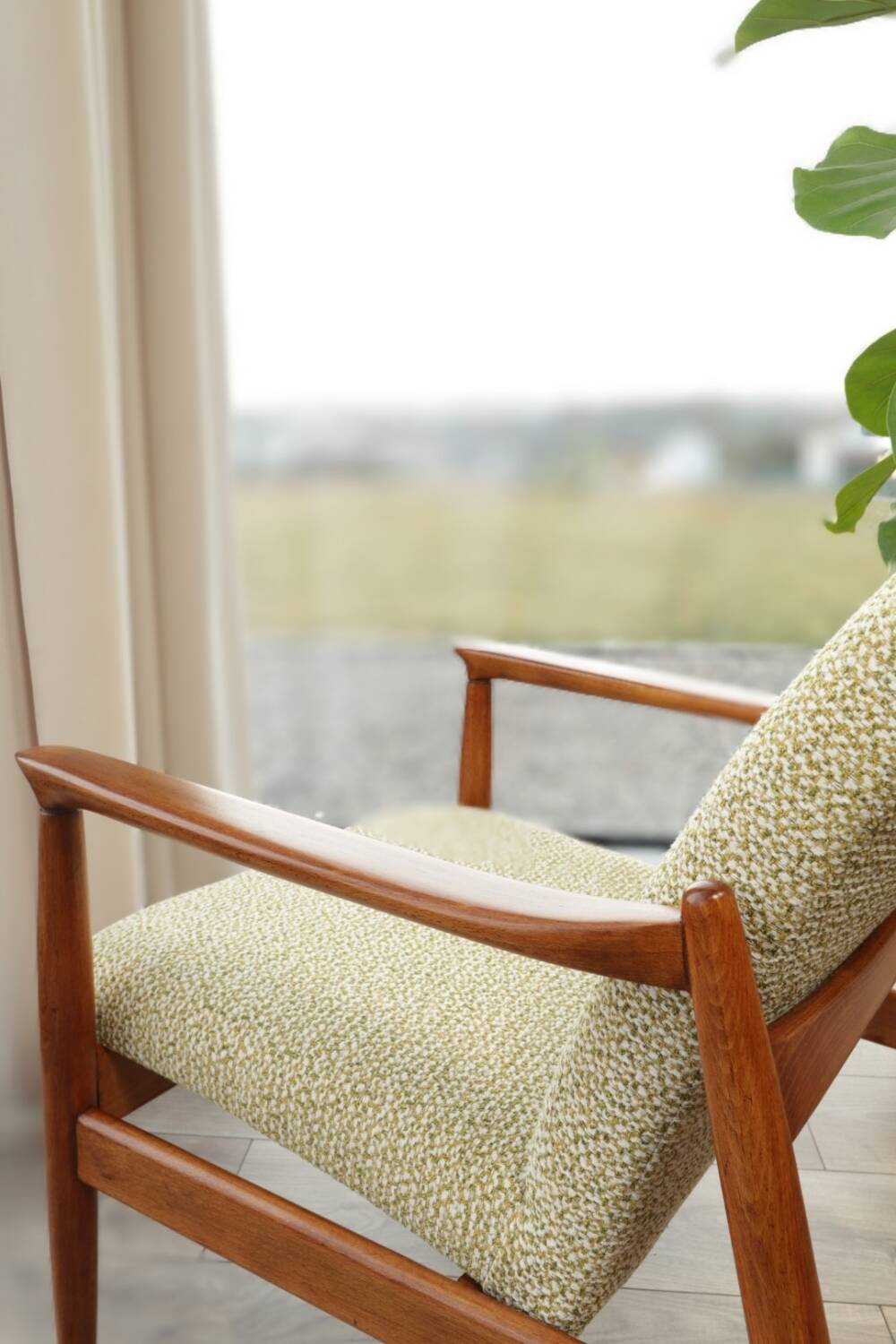 Vintage armchair with a green nebula design by E. Homa, 1970.