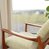 Vintage armchair with a green nebula design by E. Homa, 1970.