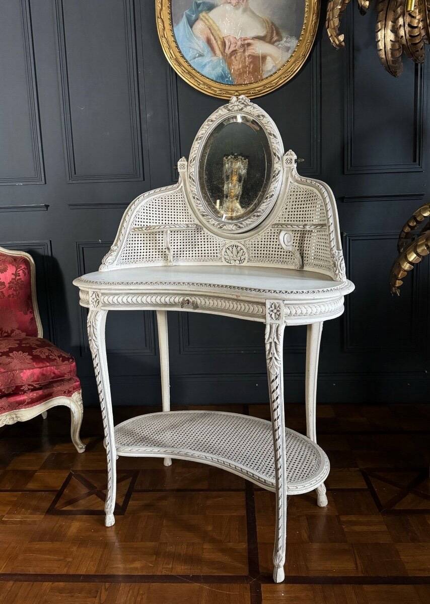 Coiffeuse du XIXe en bois peint et cannage de style Louis XVI