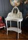 Coiffeuse du XIXe en bois peint et cannage de style Louis XVI